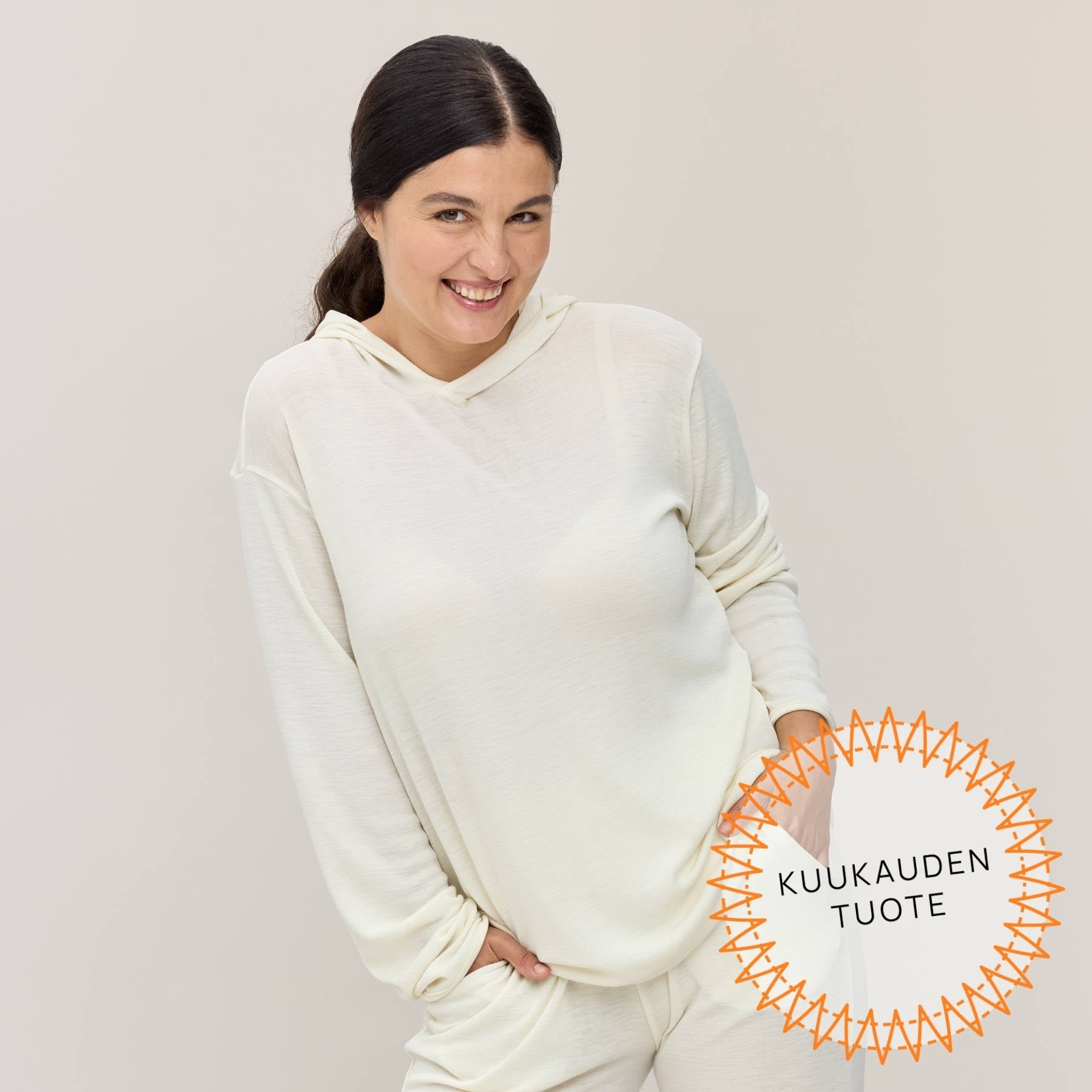 Luonnonvalkoinen merinosilkkinen unisex huppari valmistettu Suomessa.