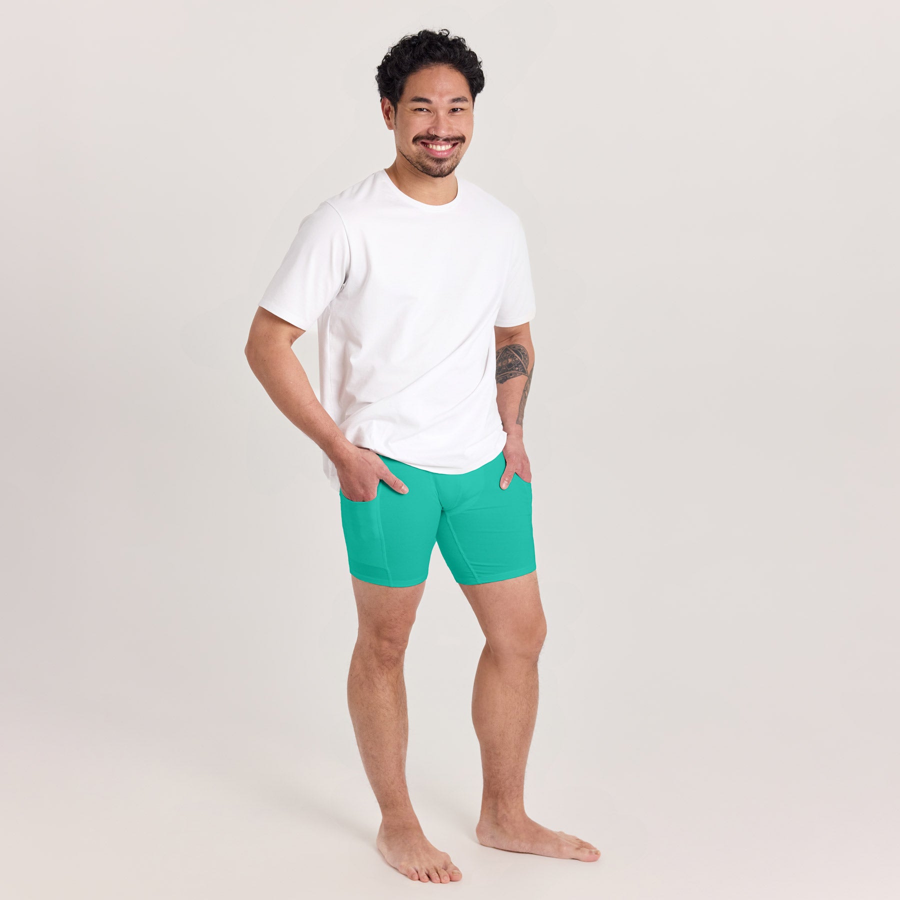 Miesten taskukalsarit kirkkaan vihreän värisenä.