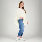 Luonnonvalkoinen KLASSIKKO poncho merinosilkistä. Poncho on kevyt, mutta lämmin asuste.